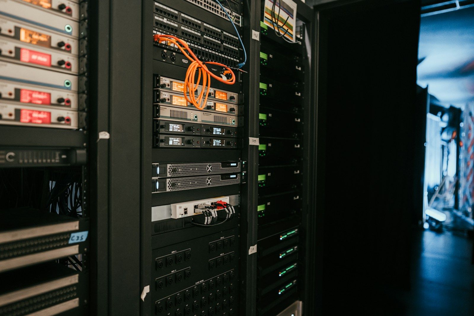 Equipment racks with patch cabling